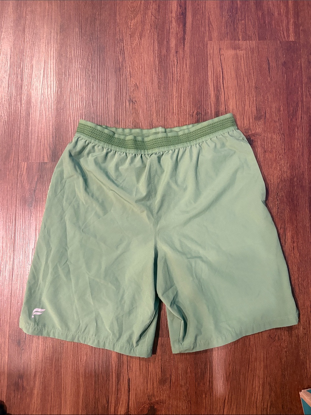 Fabletics Men's 7 inch lined Athletic Shorts in Sage Green